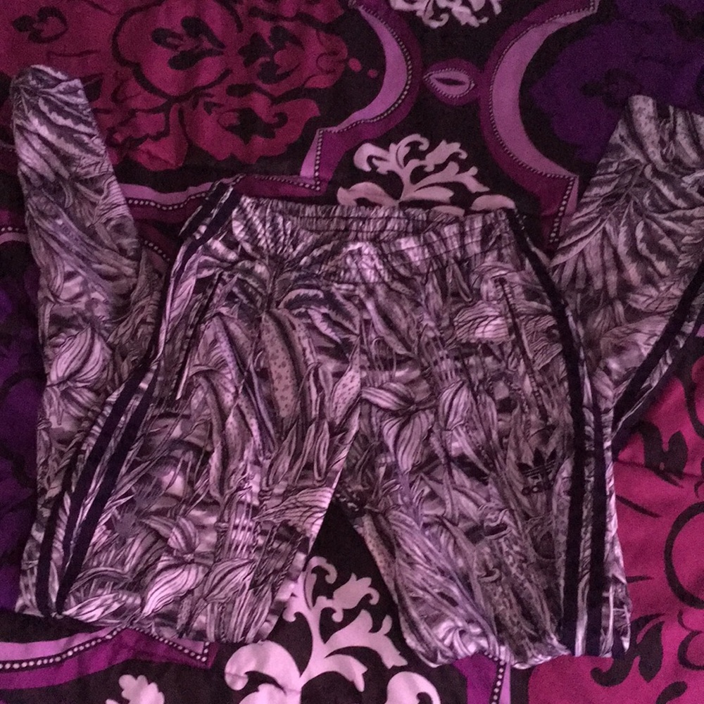 Black and white Adidas pants with pockets